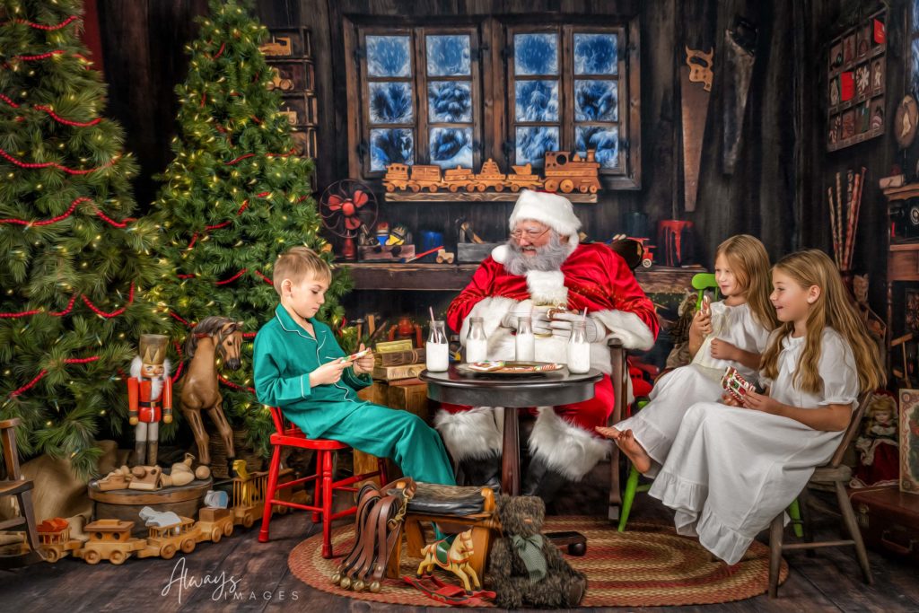 Magical Santa Art created from Santa pictures at the Always Images Photography studio of Santa sitting with three children in pajamas. 