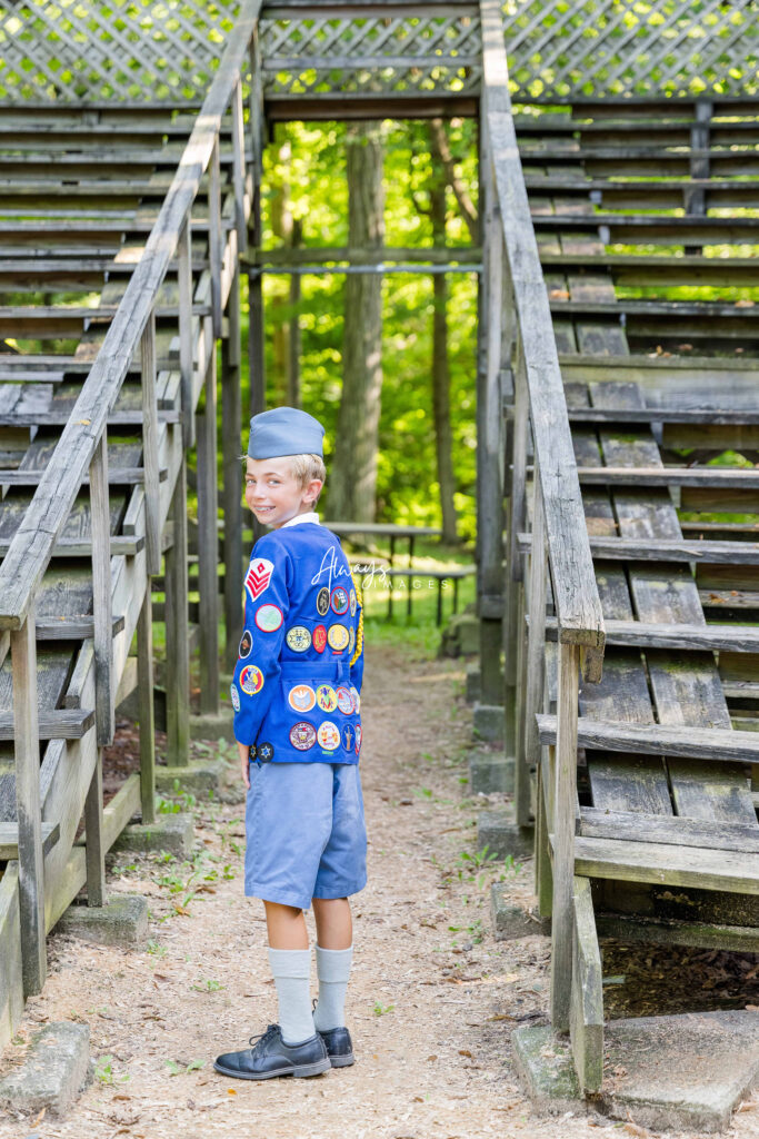 Culver Woodcraft Camper in uniform at in the Woodcraft Camp Indian Dance area.