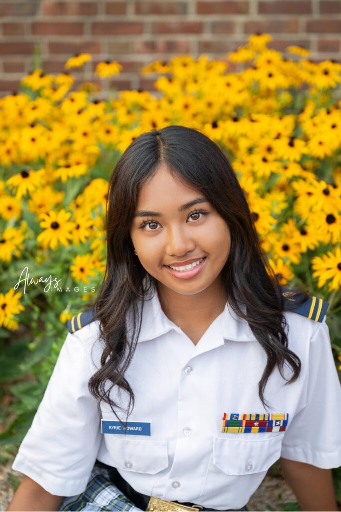 Culver Upper Camp Portrait of girl in black eyed Susan flowers on Culver's campus. 
